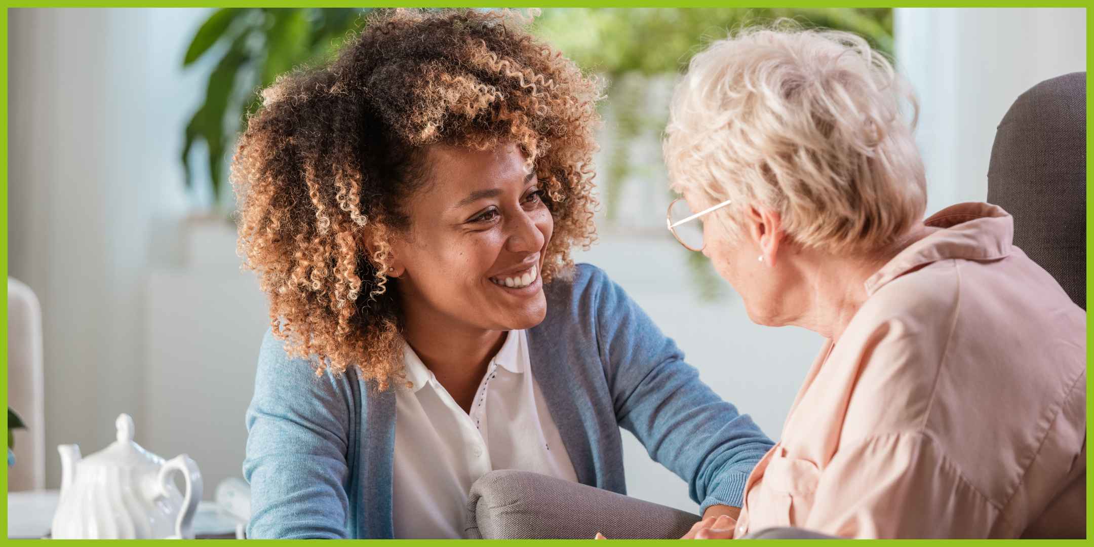 Two women talking and smiling